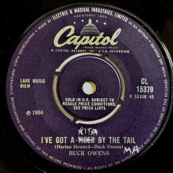 Buck Owens - I've Got A Tiger By The Tail